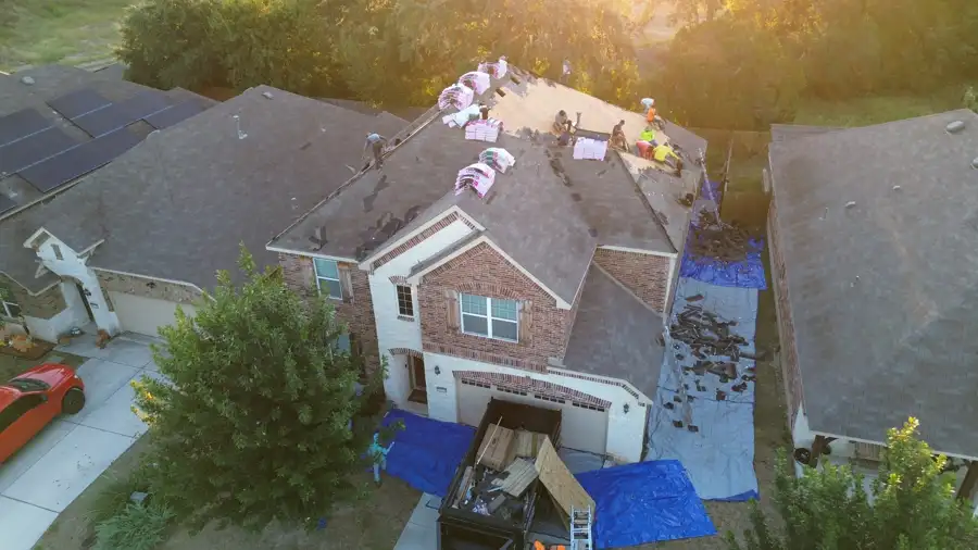 1. Shingles loaded on the roof