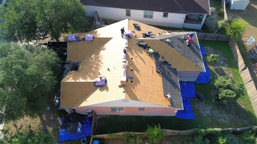 New decking going down after tear-off by DNA Restoration & Construction