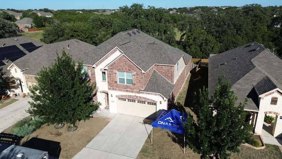 Completed roof with the DNA tent out front by DNA Restoration & Construction